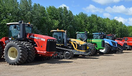 A line of various High Horsepower Tractors